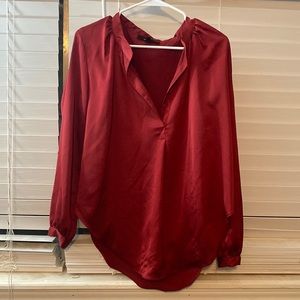 Super cute silk blouse. Looks really nice on